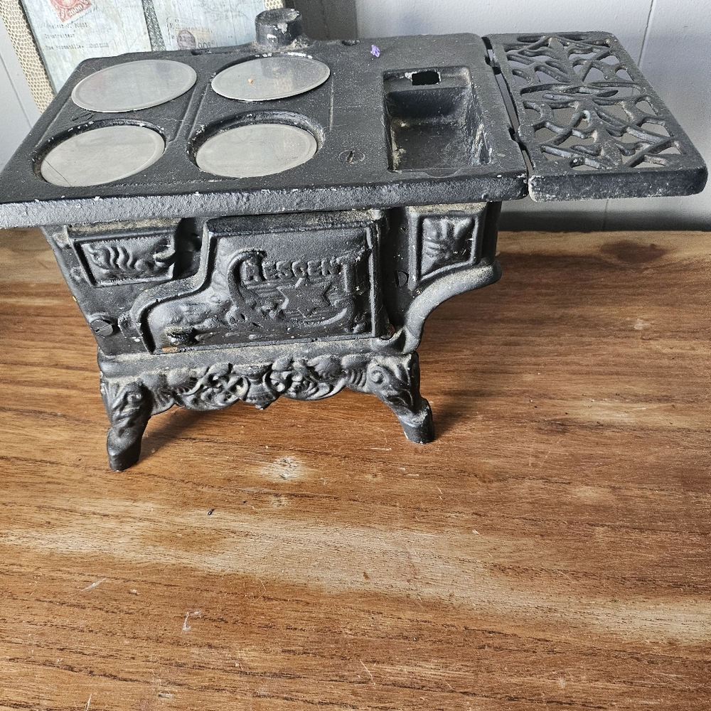 Vintage cast iron crescent stove